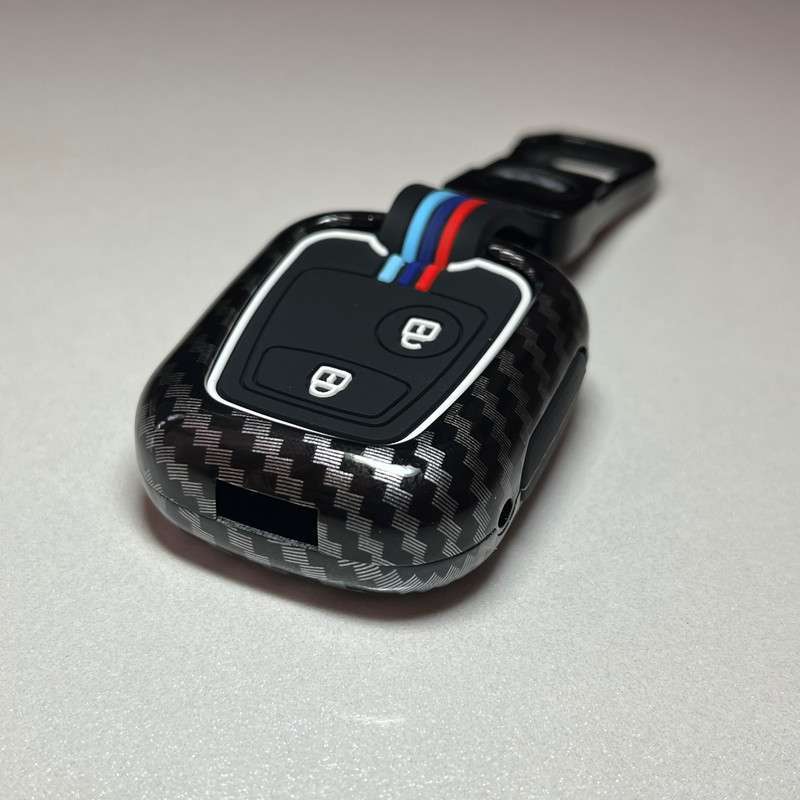 کاور ریموت و سوئیچ خودرو مدل کربنی دور فلزی شبرنگ کد MC-PG-C مناسب برای پژو 206 و 207